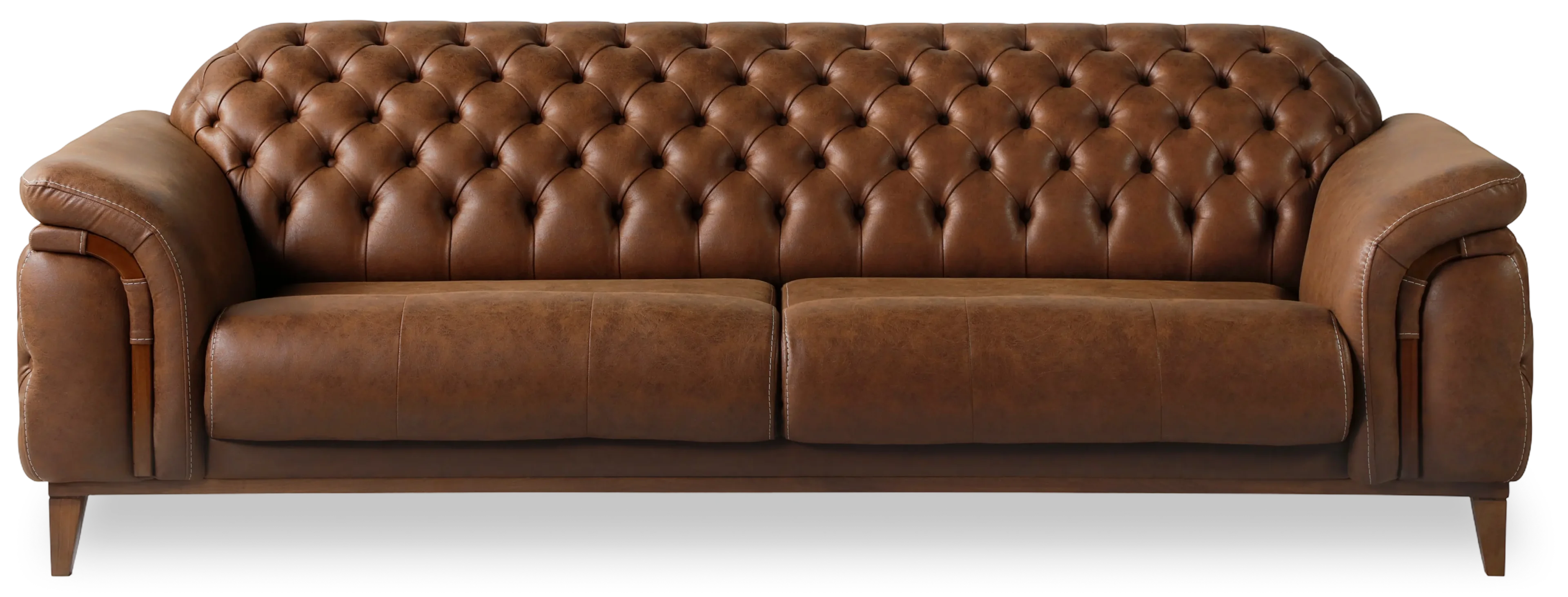 Brown leather tufted sofa on black background.